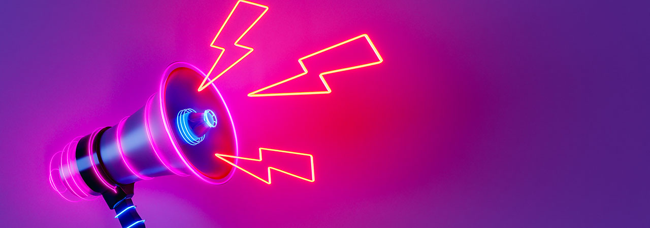 Blitze aus einem neonfarbenen Megafon